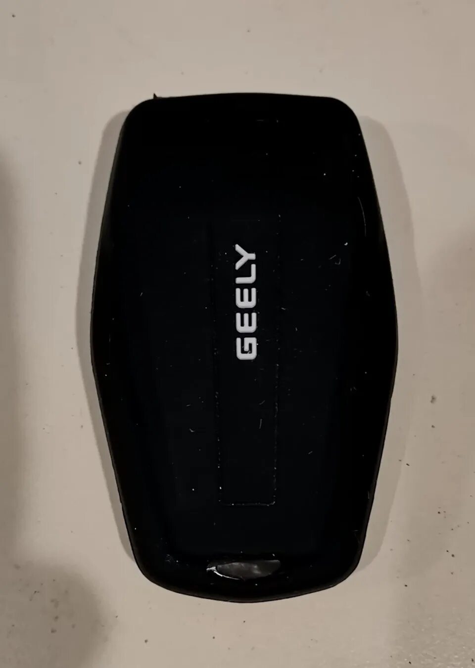 Смарт ключ джили кудрей. Держатель для телефона geely coolray. Чехол для ключа geely coolray. Geely coolray ключ. Geely coolray прикуриватель.