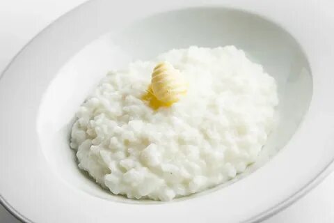 Тарелка с рисовой кашей