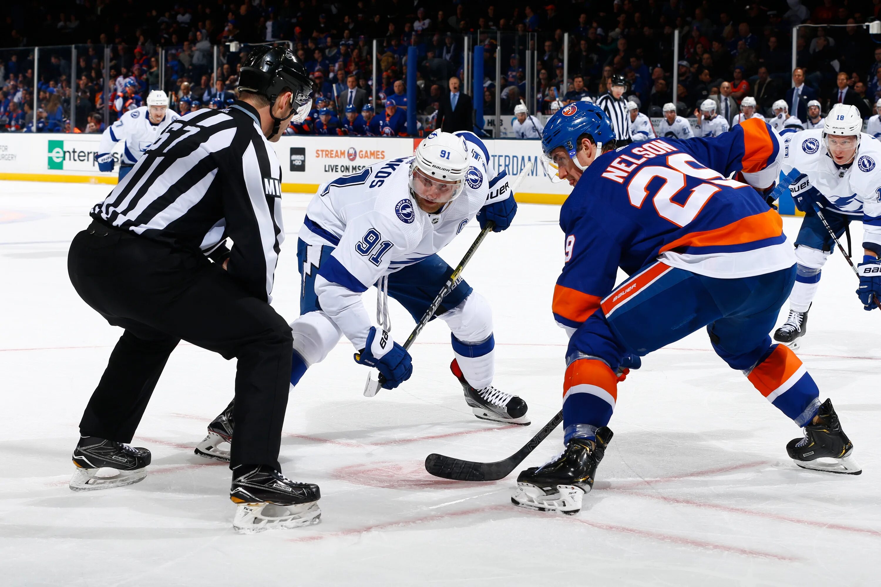 Игры 12 февраля. НХЛ Нью-Йорк Айлендерс команда. New York Islanders - Tampa Bay Lightning. NHL Tampa Bay Lightning New York Islanders.