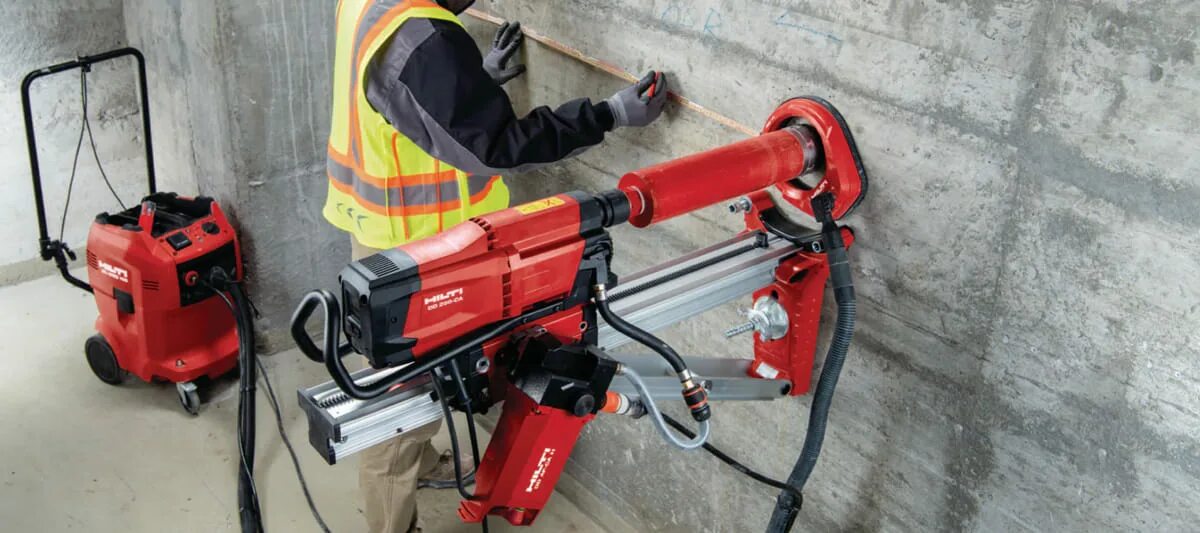 Алмазное бурение хилти 250. Hilti DD 250e. Hilti DD 250. Станок алмазного бурения Hilti. Алмазное сверление расценка