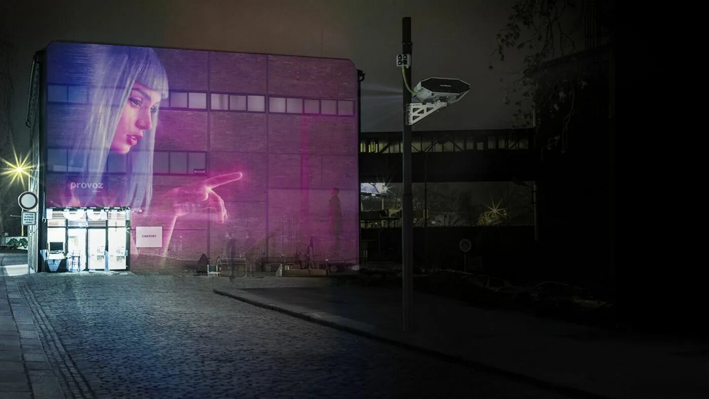 Граффити достоевский питер. Проектор уличный рекламный. Гобо проектор проекция. Проектор рекламный на фасад. Проекционная реклама на фасаде.