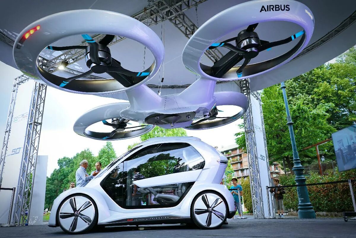 Средство будущее. Беспилотный транспорт будущего. Беспилотные летающие машины. Машины дроны. Airbus электрический летающий автомобиль.