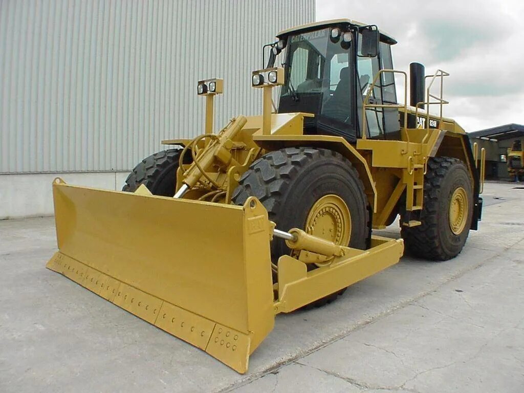 бульдозер на колесах. колесный бульдозер wd600. Caterpillar 24m. Caterpillar 814f ii. Caterpillar 844h масштабная модель.