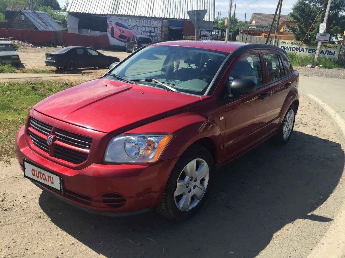 Dodge caliber 2.0. Додж Калибр 2008 2.0. Додж Калибр 2008 пороги. Додж Калибр 2008 аккумулятор. Dodge Caliber PM 4669569.