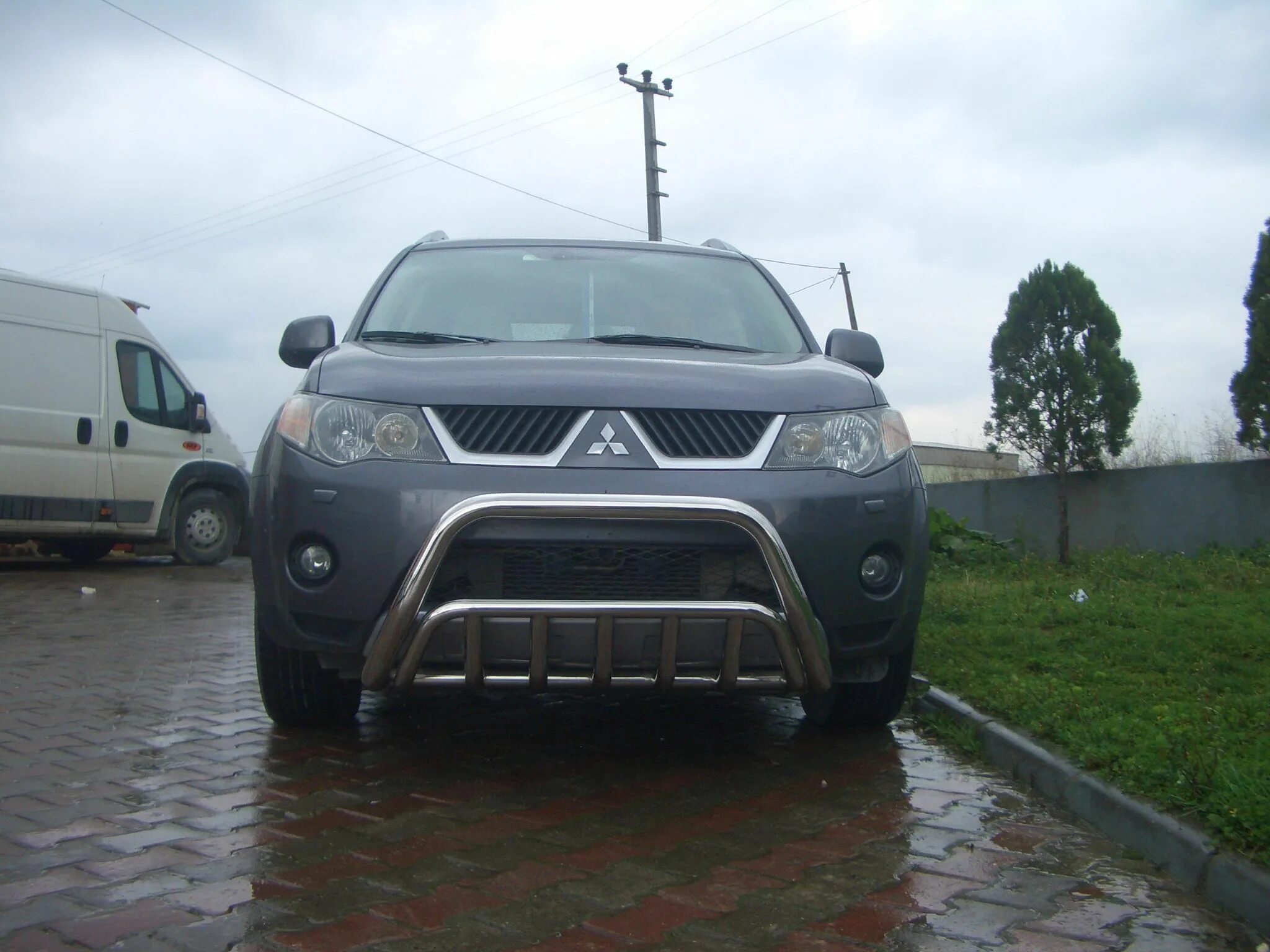 Mitsubishi outlander xl передние. Кенгурятник Mitsubishi Outlander XL. Mitsubishi Outlander 2008 кенгурятник. Митсубиси Аутлендер 2008 кенгурятник. Mitsubishi Outlander 2008 с кенгурятником.