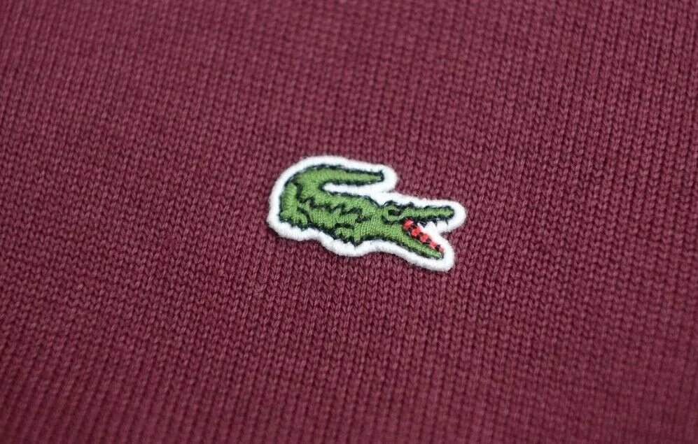 Как отличить lacoste. Lacoste оригинал. Лакост оригинальный крокодил. Значок лакост оригинал. Lacoste 1933.