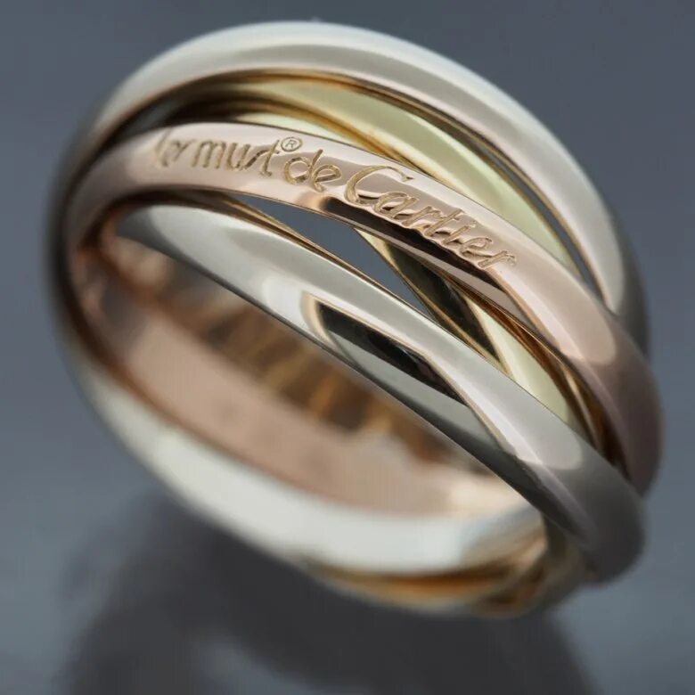 Кольцо состоит из двух. Обручальные кольца картье тринити. cartier тринити кольцо. кольцо тринити золото картье. кольцо тиффани тринити.