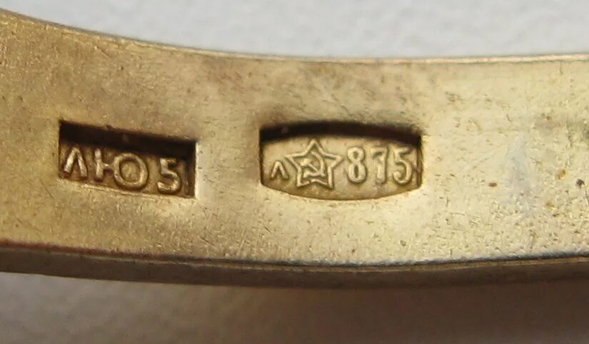 Клеймо на золоте 585 пробы. Клеймение ювелирных изделий. Клеймо на позолоте. Проба мм. Маркировка на золотых изделиях 585 пробы.