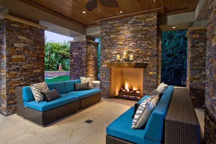 Каменные интерьеры фото This home has a stone wall that carries from the outside through to the entryway