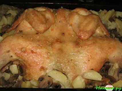 Курица целиком с грибами и картошкой