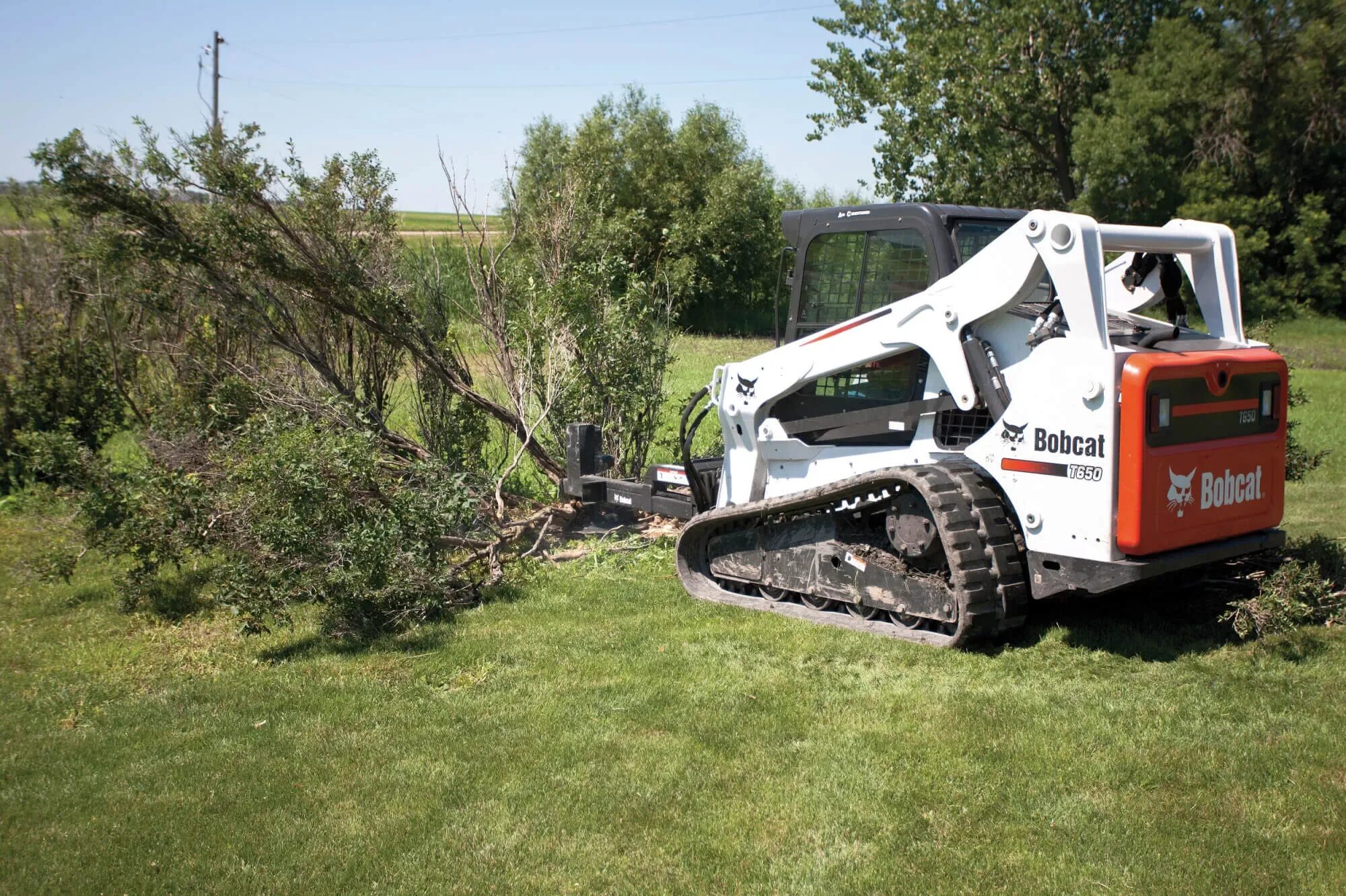 Bobcat гусеничный. Мини-погрузчик Bobcat t650. Гусеничный мини погрузчик Bobcat t650. Бобкэт 650. Гусеницы Bobcat t650.