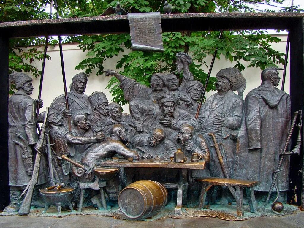 Памятник запорожцам в краснодаре. Письмо запорожцев турецкому султану памятник краснодар. Памятники запорожцам. Памятник запорожцам в краснодаре. Скульптура запорожские казаки краснодар.