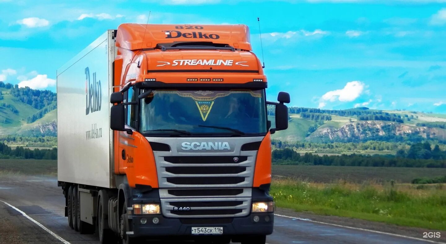 Скания тягач Делко. Фура Скания Делко. Scania r440 Делко. Скания оранжевая Делко 440.