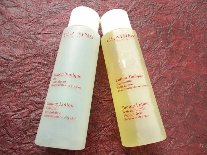 Toning lotion. Clarins тонер. Clarins желтый тоник. Clarins тоник для жирной кожи. Тоник Clarins Paris.