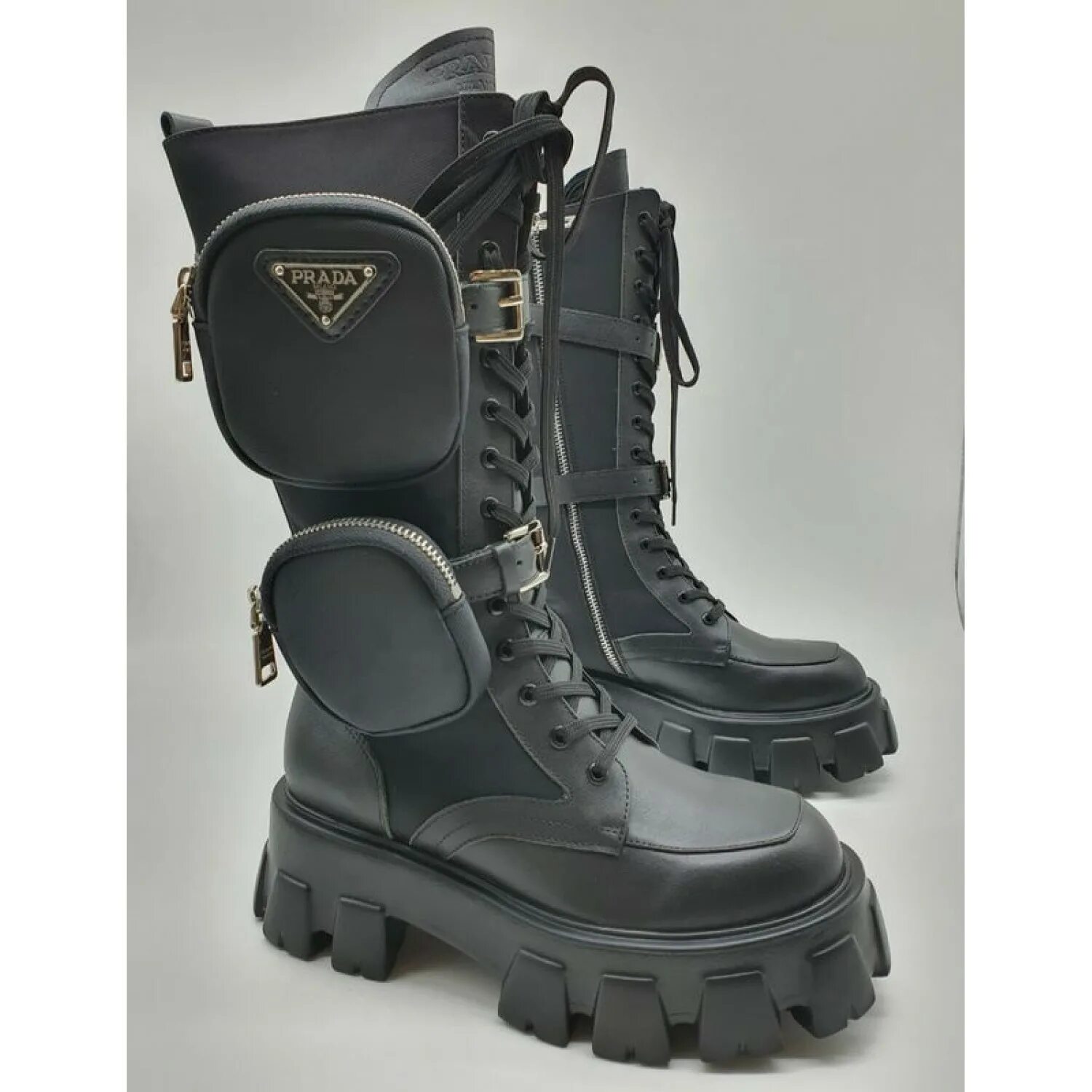 Прада сапоги высокие. Сапоги высокие prada. Prada дутые сапоги moon 1w735lf0103o8b. Сапоги prada 2020. Сапоги прада черные.