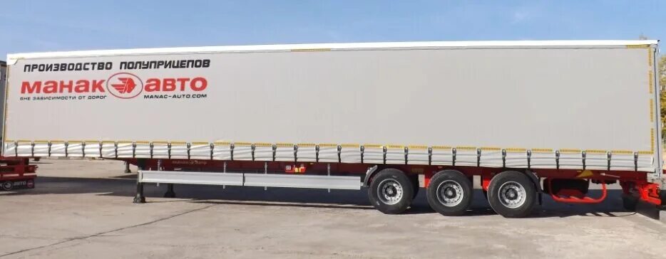 Манак авто старый оскол. Манак авто тралы. Самый длинный прицеп для фуры. Низкорамный трал манак авто. Прицеп манак авто.