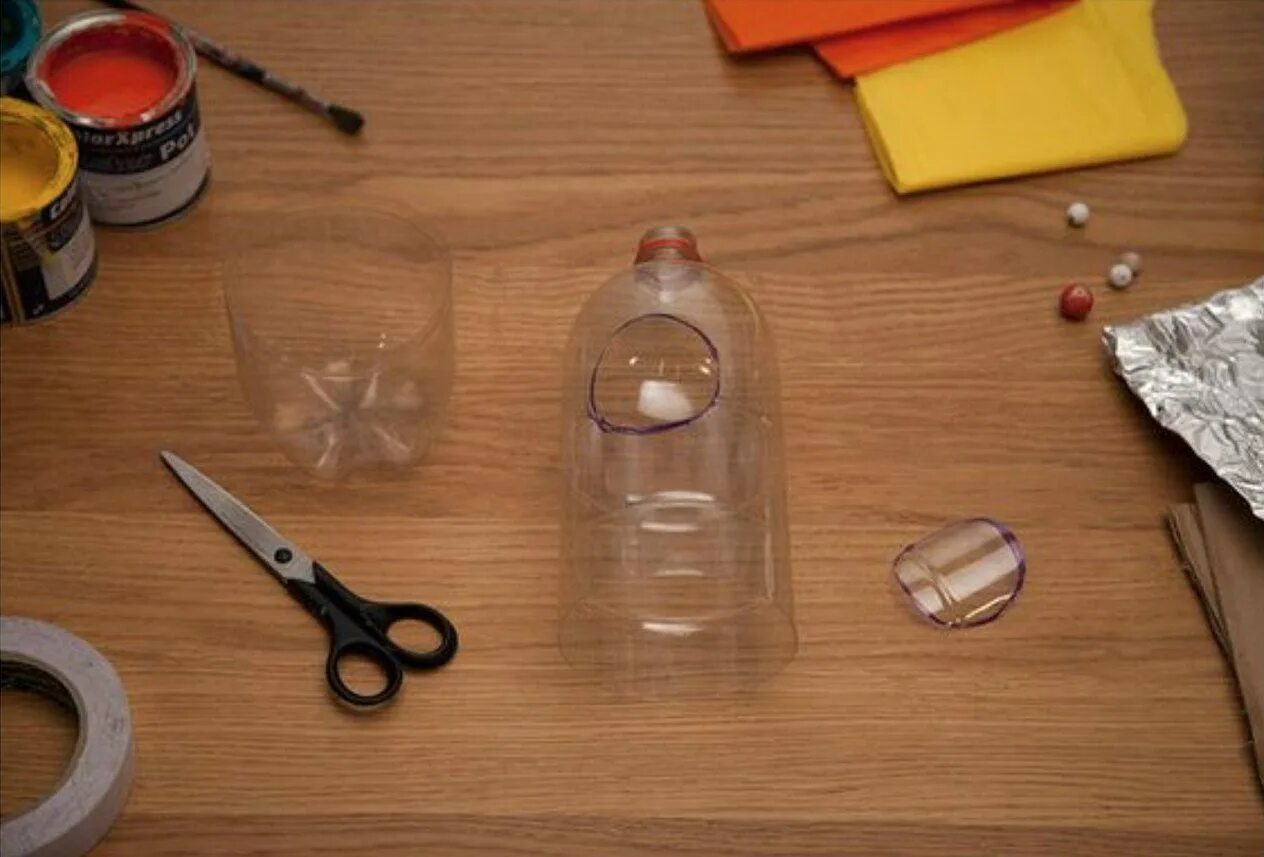 поделка ракета своими руками. как сделать ракету из бутылки. р арета из пластиковой бутылки. ракета из бутылки. макет ракеты.