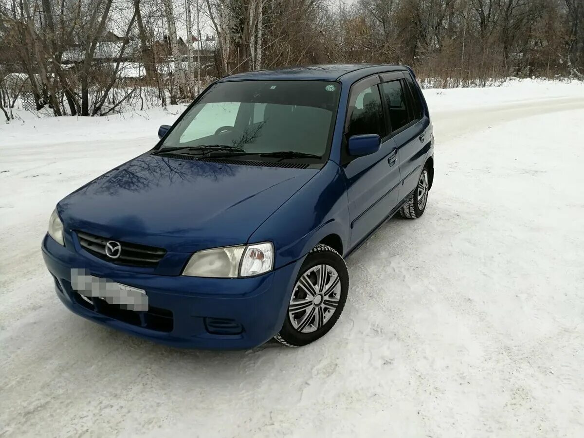 Мазда демио 2001 купить. Mazda Demio 2001. Mazda Demio 2001г. Мазда Демио 2001 1.3. Мазда Демио голубая 2001.