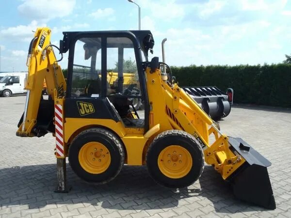 Экскаваторы погрузчики jcb б у. Погрузчик JCB 1cx. Мини экскаватор погрузчик JCB 1cx. JCB 1cx гусеничный. JSB экскаватор 1cx.