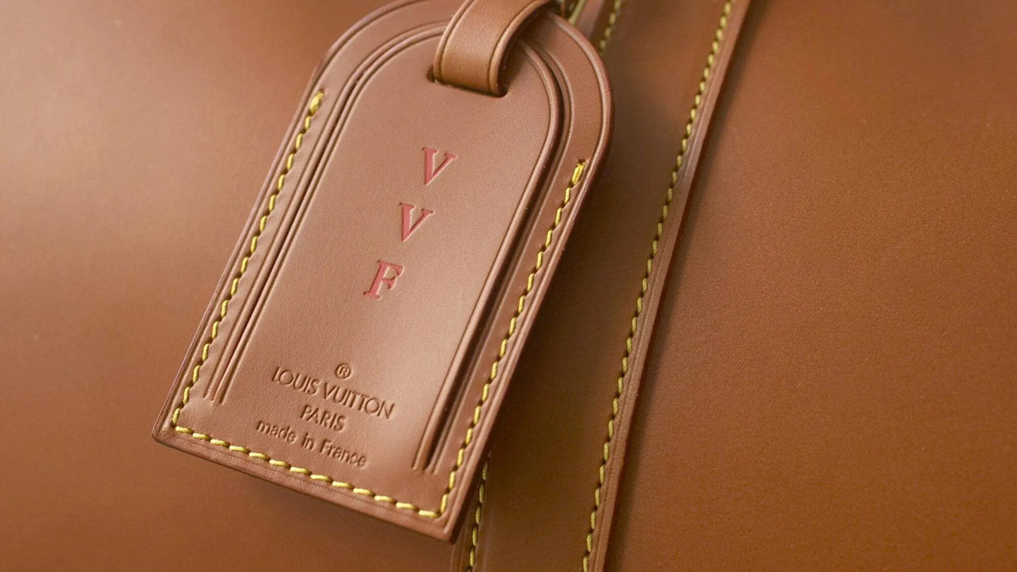 Горячее теснение Луи витон. Тиснение Луи Виттон. Бирка Луи Виттон. Louis Vuitton Malletier Paris. Апфс lv