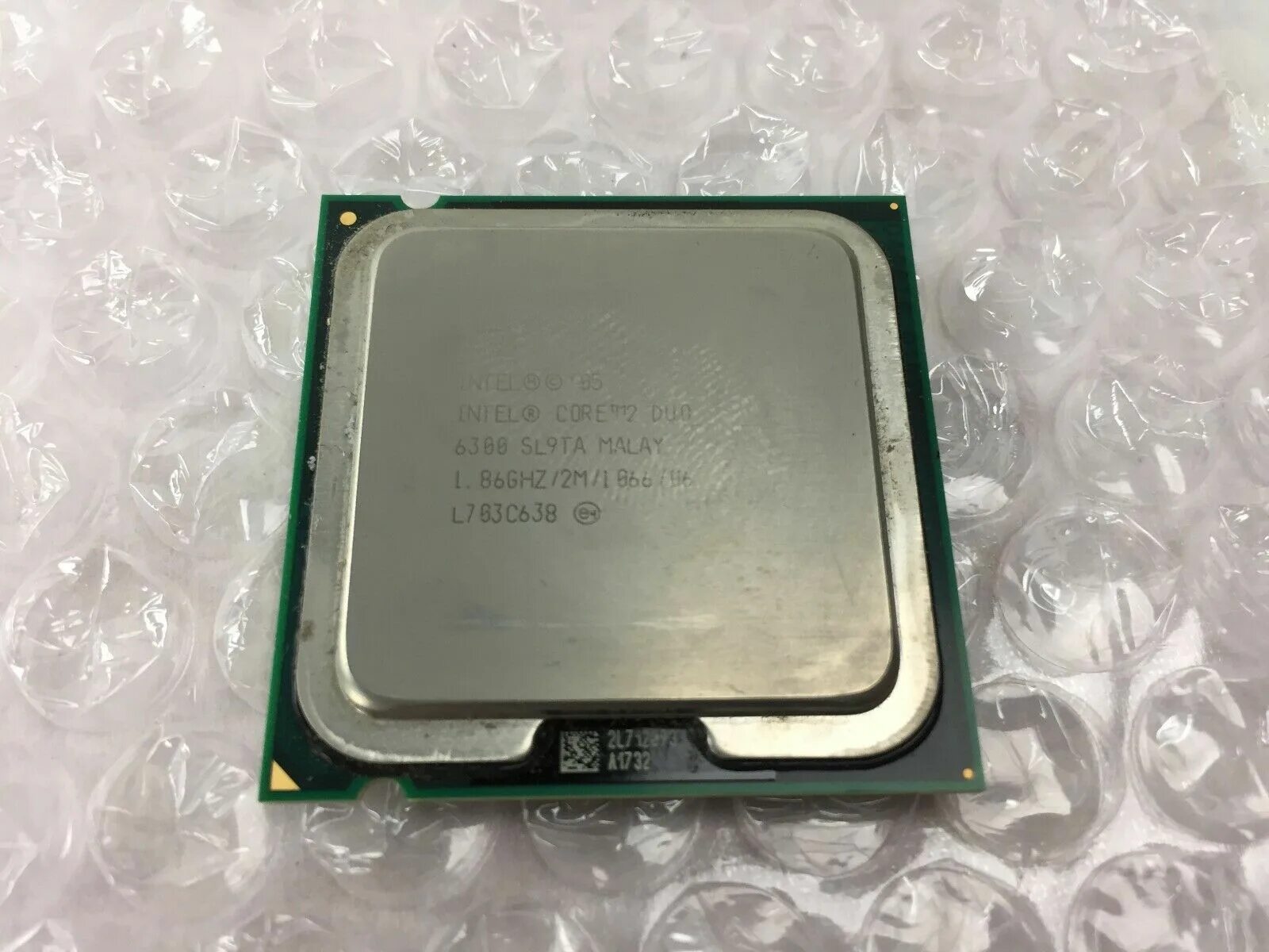 Процессор интел коре дуо. Процессор Intel Duo 2 1.86 ГГЦ. Intel Core 2 Duo e6300 Processor. Intel Core 2 CPU 6300 1.86GHZ. Intel Core 2 Duo 6300.