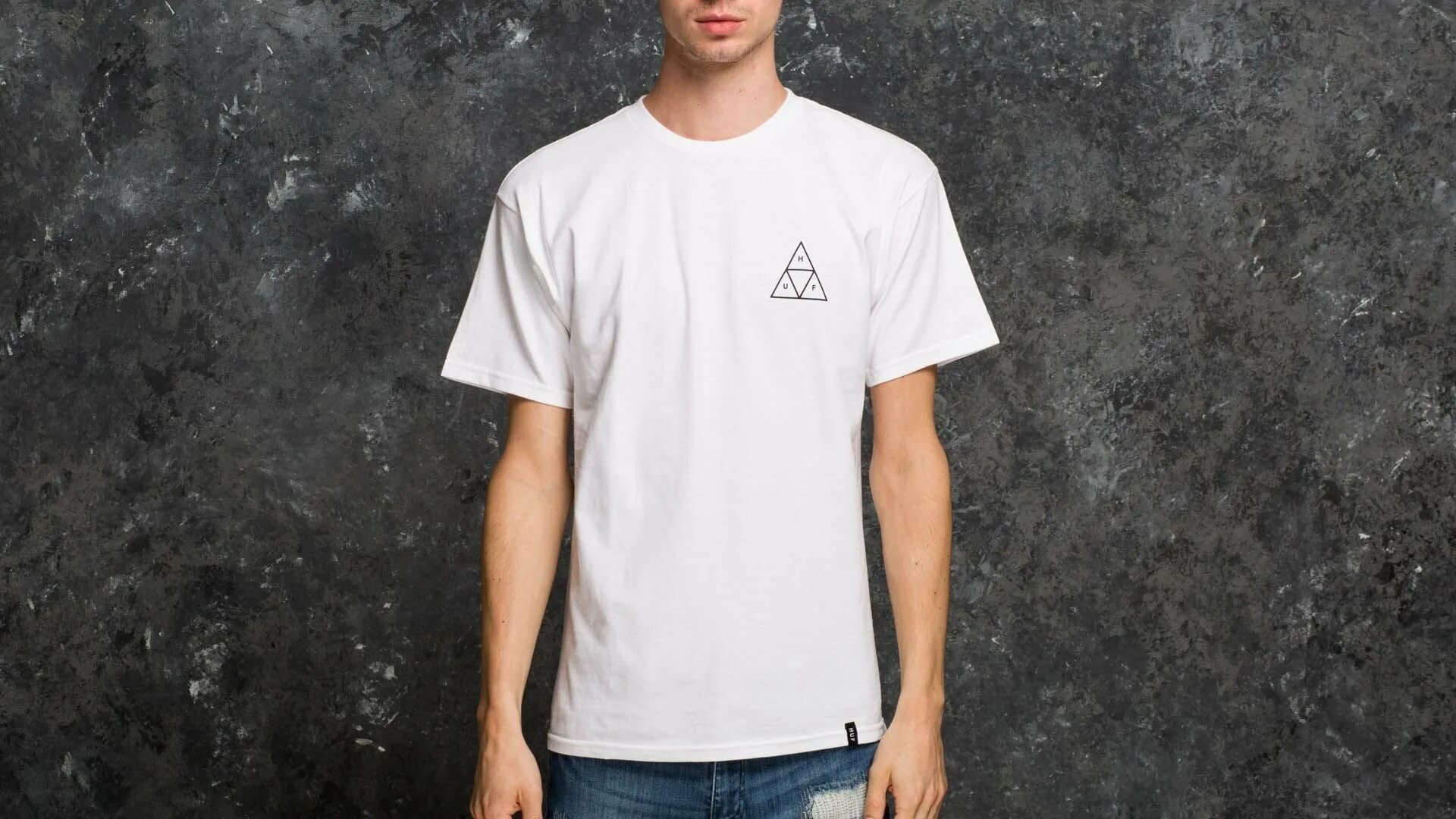 He s wearing a t shirt