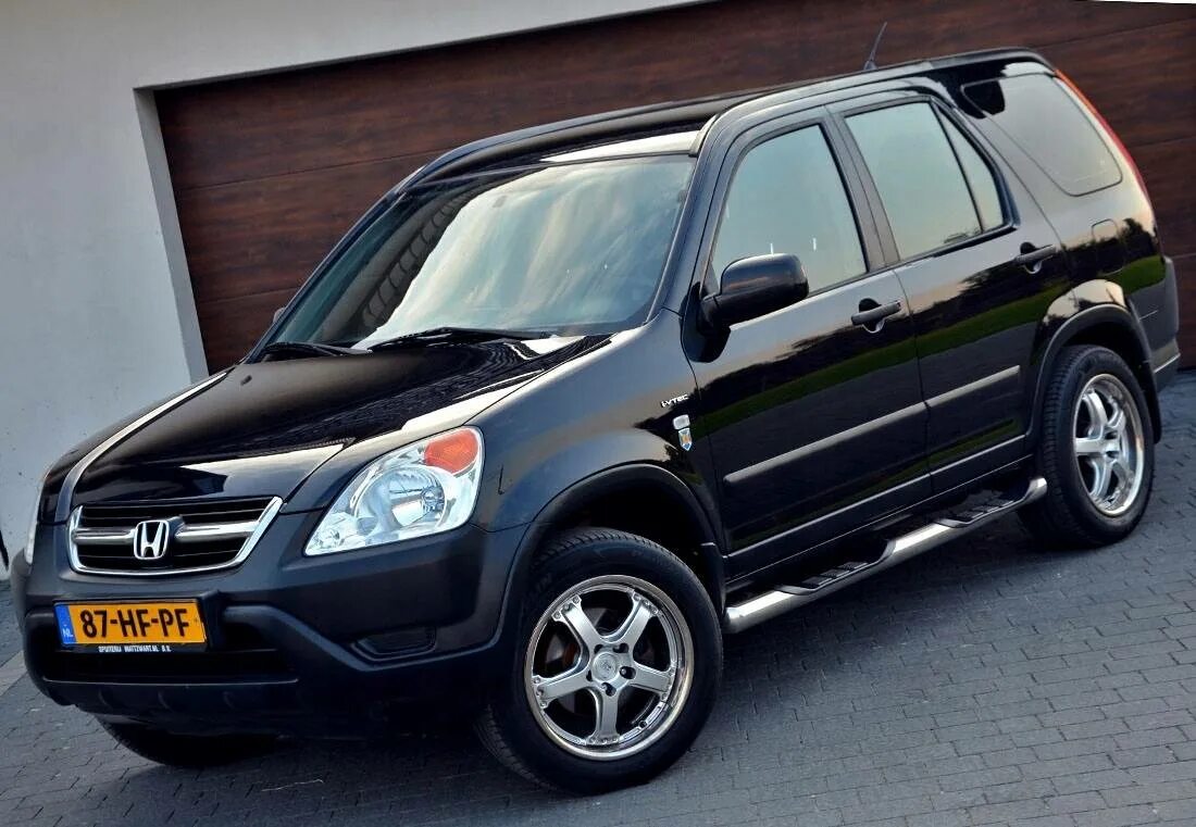 Хонда cr v поколения. Honda CRV 2005. Honda CRV 2 2005. Honda CRV 2.2. Honda CR-V 2 2006.