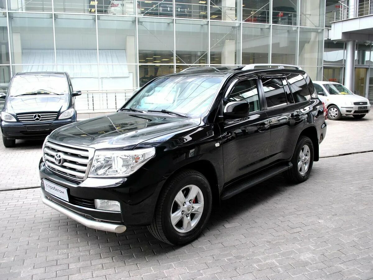 Крузер 200 купить с пробегом в москве. Toyota Land Cruiser,200 2011 черный. Toyota Land Cruiser 200 Series 4.5d at 235 л.с. Крузер 200 2011 черный. Ленд Крузер 200 235 лс дизель.