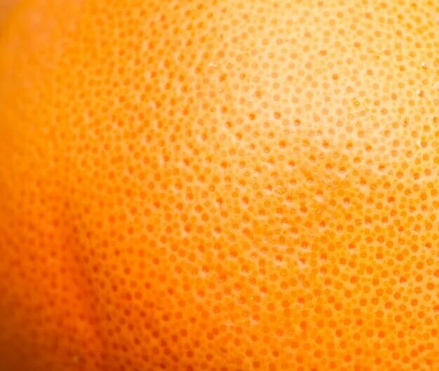 Фактура апельсина. Шкурка апельсина. Кожура апельсина макросъемка. Апельсиновая кожа. Корка апельсина.