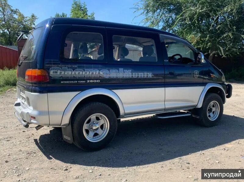 Оракал на Митсубиси Делика. Делика 2012 год.Митсубиши. Наклейки на Mitsubishi Delica. Наклейки Митсубиси Делика на борт машины. Купить мицубиси делику во владивостоке