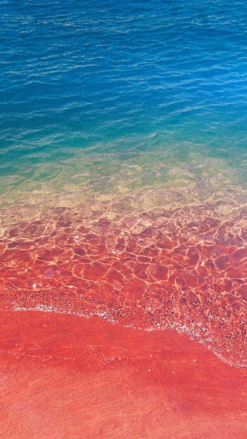 Летние обои на айфон. Айфон IOS 11. Розовое море. Розовое лето. Море с розовым песком.