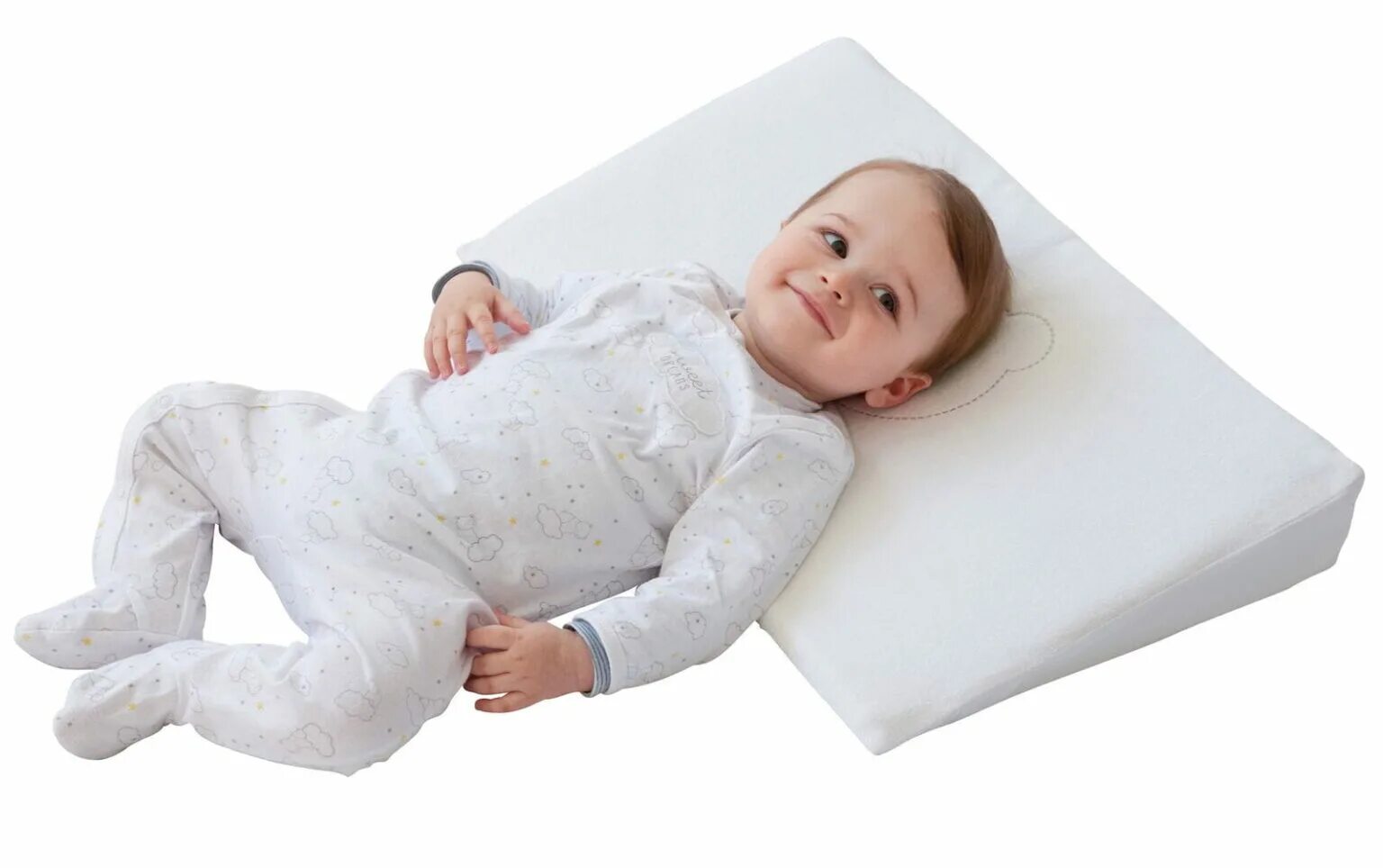 Какие подушки в год ребенку. Подушка детская. Подушка для новорожденного. Ортопедическая подушка для новорожденных. Наклонная подушка для новорожденного.