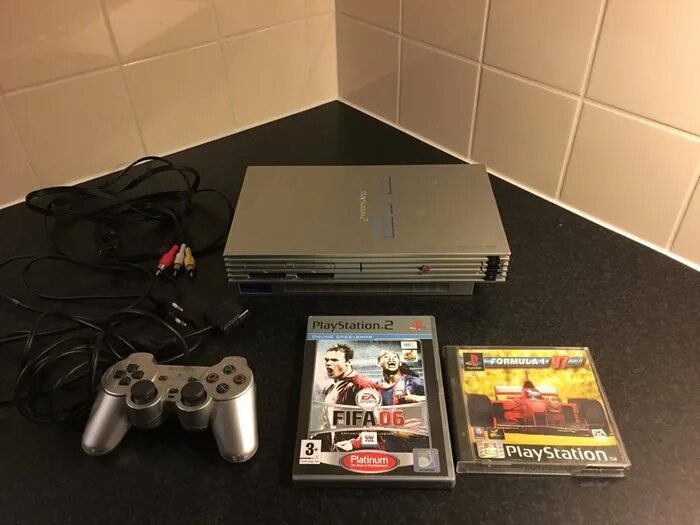 Sony PLAYSTATION 2 ps2. Ps2 Silver. Sony PLAYSTATION 2 2006. Sony PLAYSTATION 2 Slim 9000x. Ремонт плейстейшен 2