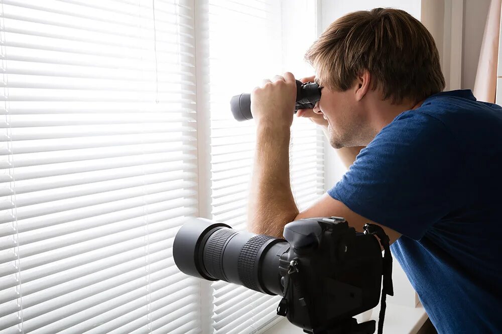 Spying. Бабушка с биноклем. Spy stock photo. Spying Home. Spying pictures.