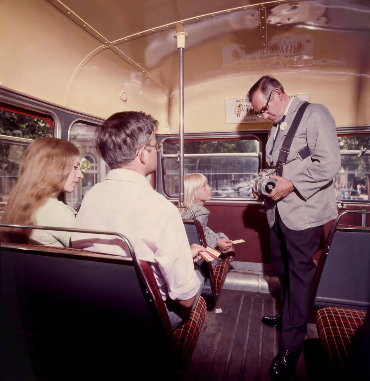 They go to work by bus. Лондонский кондуктор. bus conductor. london bus conductor. electro bus conductor.