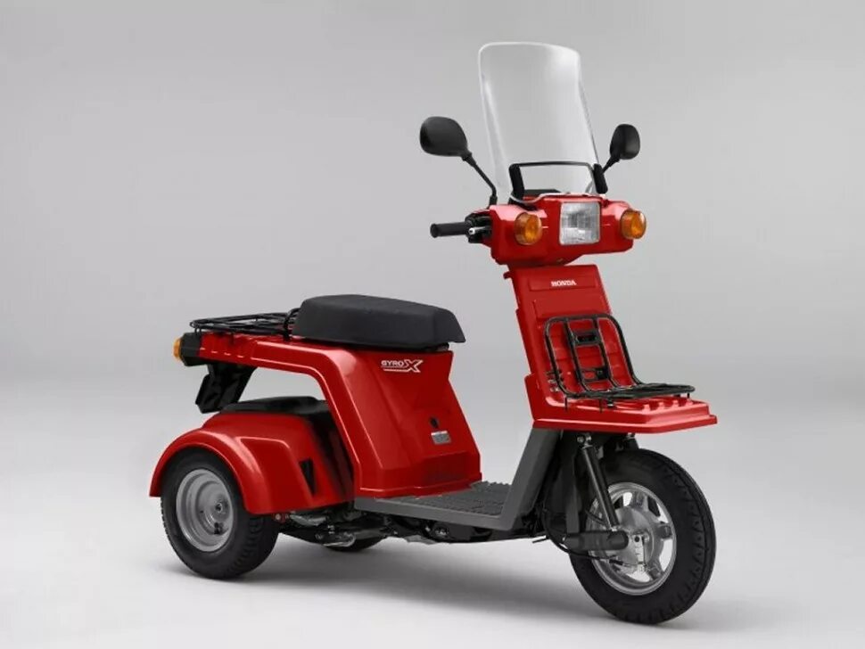 Скутер gyro. Honda Gyro x 50. Трёхколёсный скутер Honda Gyro. Трехколесный мопед Хонда 50 кубов. Трехколесный мопед Хонда Gyro.