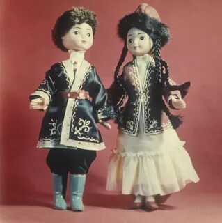 Тема кукла в национальном костюме