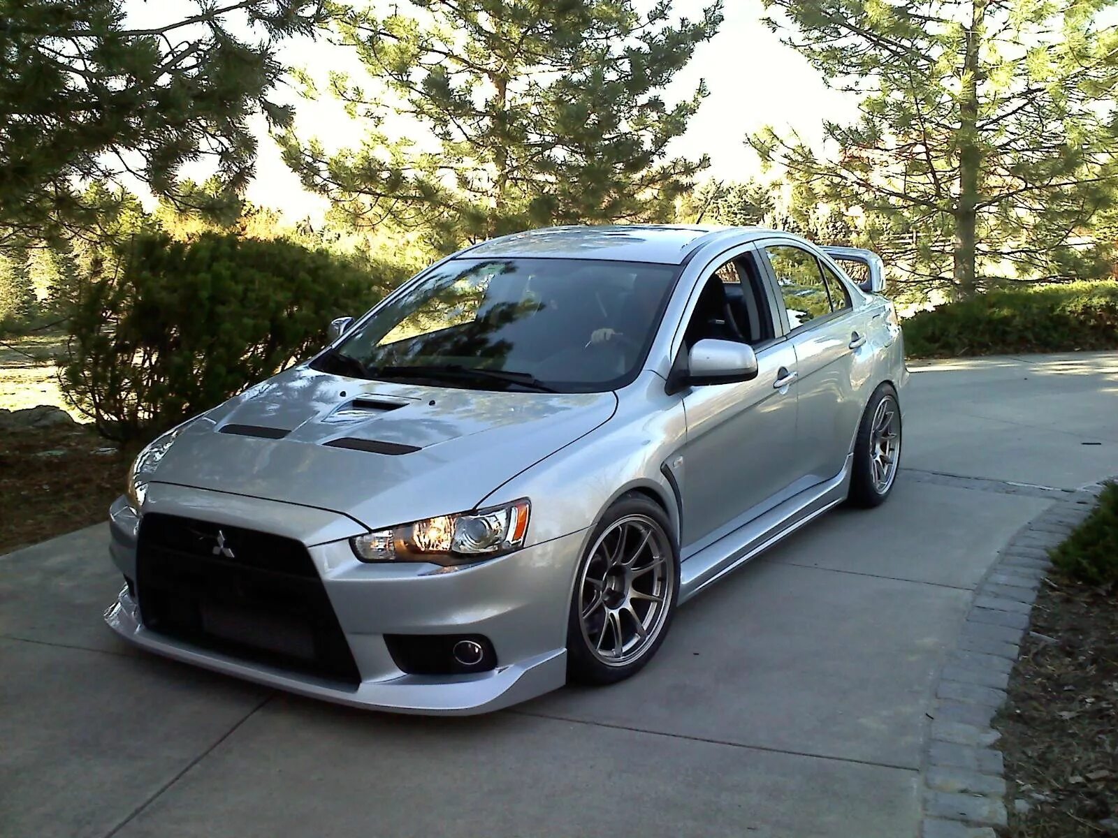 Lancer x 10. Mitsubishi Lancer Evolution 10. Тюнингованный Mitsubishi Lancer 10. Тюнингованный Митсубиси Лансер 10. Mitsubishi Lancer Evolution x 2010.