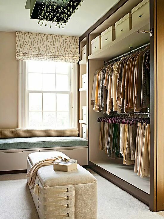 Next to the wardrobe