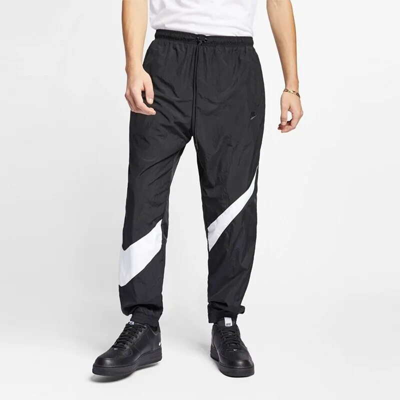 Nike штаны Swoosh Woven. Мужские брюки Nike Air Pant WVN. Nike big Swoosh штаны. Мужские брюки Nike Sportswear Woven Pants.