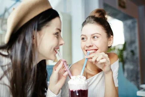 2 girls and 1 glass