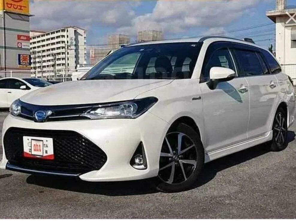 Тойота во владивостоке 2019 купить. Toyota Corolla Fielder 2018. Тойота Филдер гибрид 2018. Тойота Королла Филдер 2018. Toyota Corolla Fielder Hybrid 2018.