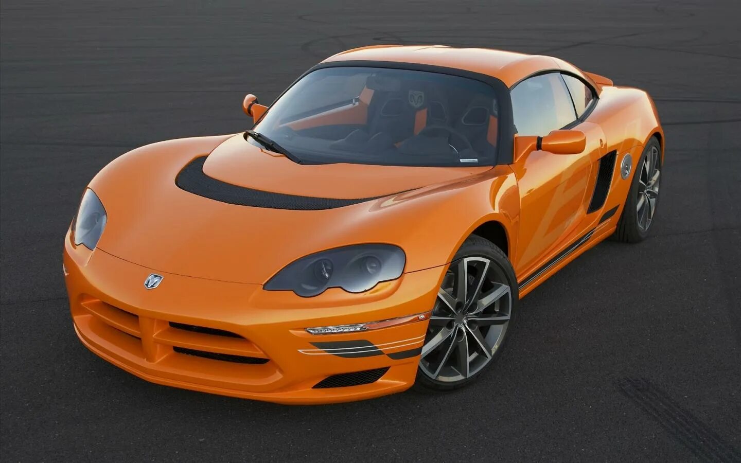 Включи оранжевый автомобиль. Dodge circuit ev. Оранжевый спорткар Chevrolet. Спорткар Лотус оранжевый. Dodge Electric 2022.
