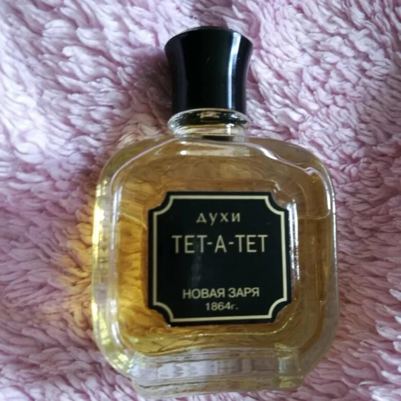 Тет а тет духи новая заря. Новая заря 1864. духи тетатет. тет а тет новая заря. туалетная вода tet-a-tet.