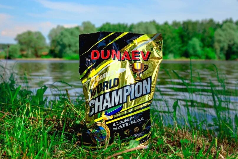 Прикормка озеро. Прикормка Dunaev-World Champion. Дунаев чемпион прикормка. Дунаев ворлд чемпион прикормка. Дунаев флагман прикормка Карп.