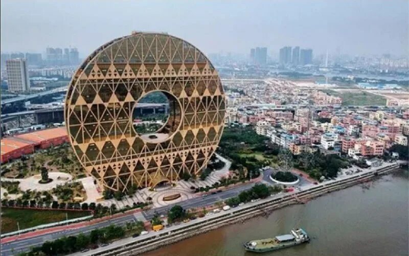 здание-монета в гуанчжоу. гуанчжоу юань небоскреб. здание монета. здание-монета в гуанчжоу. здание фан юань, шэньян.