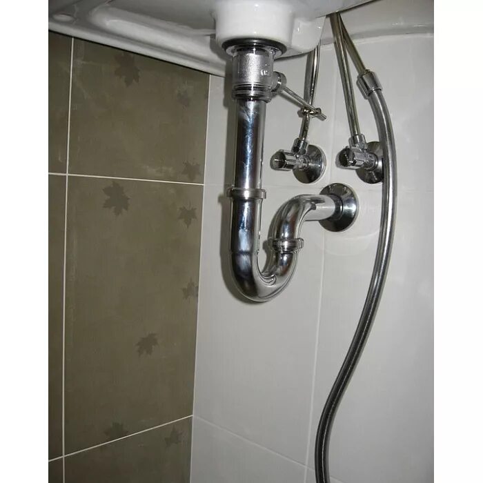 Подводка воды к смесителю на кухне. Монтаж смесителя на раковину. Сифон трубный viega 305611. Труба под раковиной. Подвод к раковине.