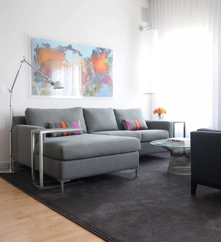 Gray Sofa with Chaise Lounge and Yellow Accents