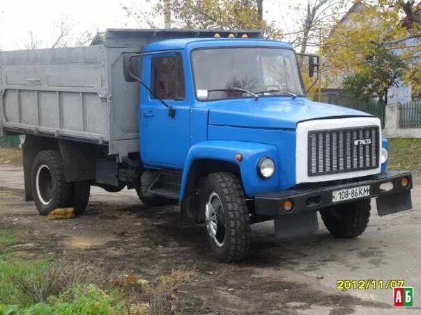 Купить б/у ГАЗ 3307 бензин механика в Волжском: белый бортовой грузовик 2011 год