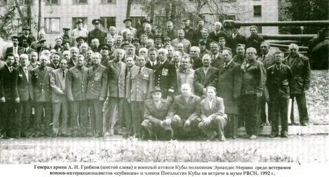 Шестой слева